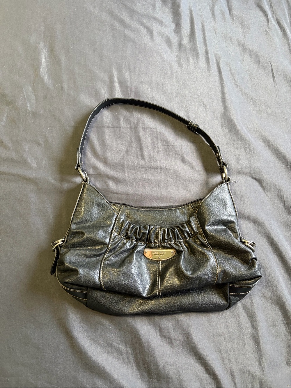Y2K 2000s Nine West black leather handbag with silver hardware.